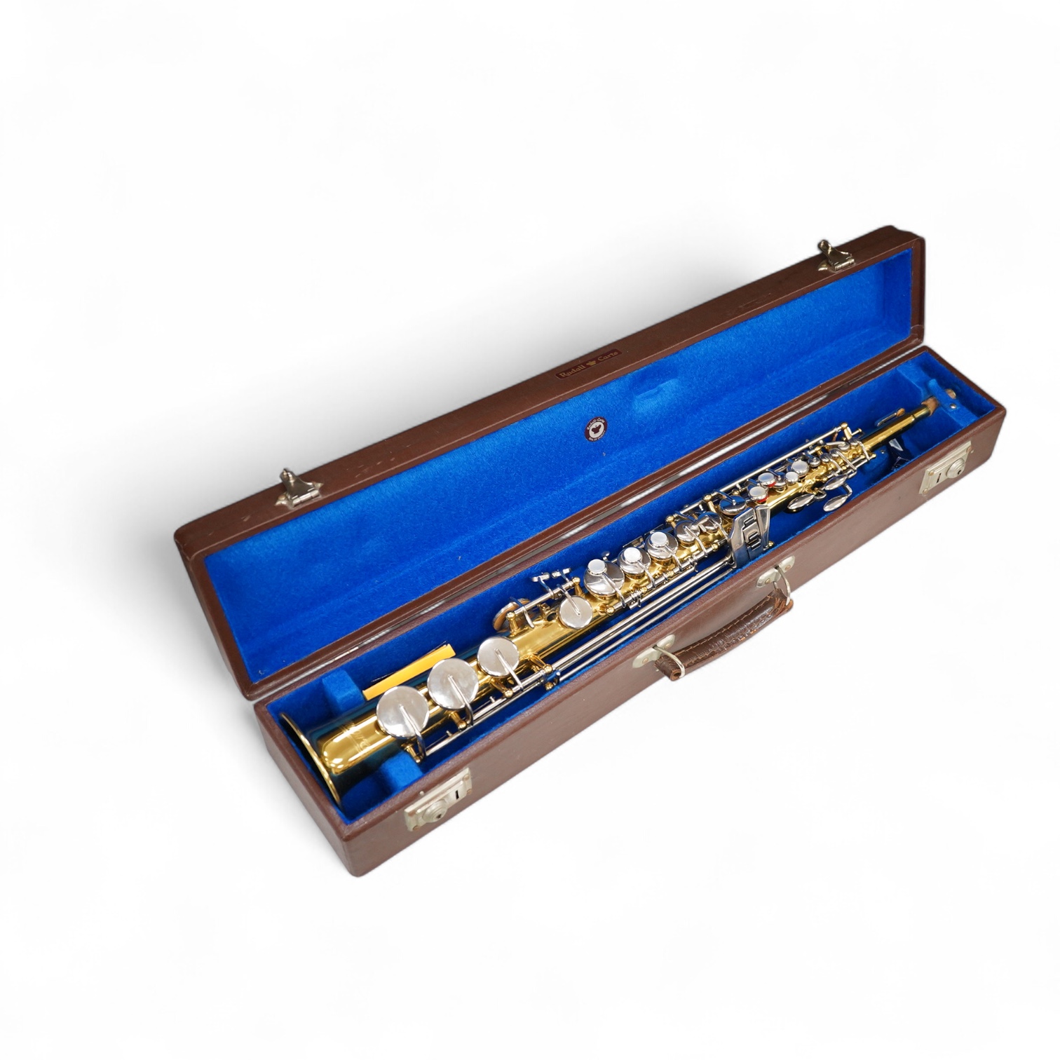 A cased Sonora soprano saxophone in a Rudall Carte branded case